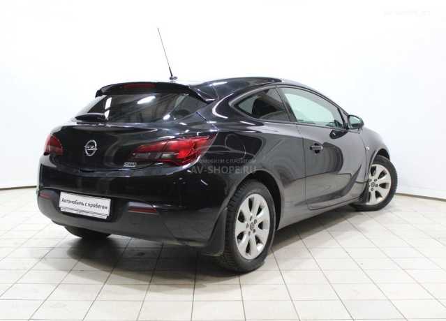 Opel Astra 1.8i MT (140 л.с.) 2014 г.
