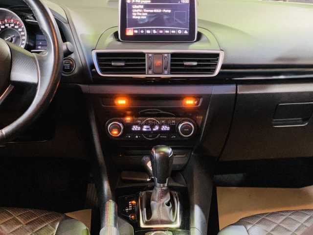 Mazda 3 1.5i AT (120 л.с.) 2014 г.
