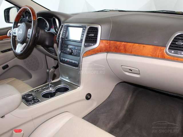 Jeep  Grand Cherokee 5.7i AT (352 л.с.) 2011 г.