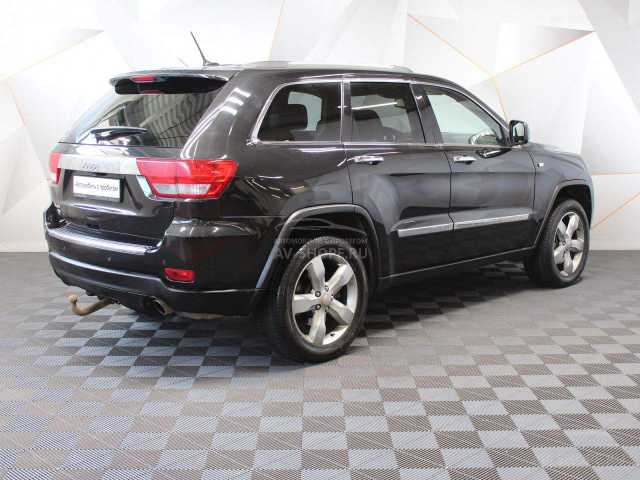 Jeep  Grand Cherokee 5.7i AT (352 л.с.) 2011 г.