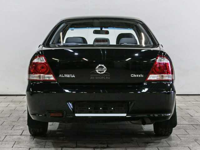 Nissan Almera Classic 1.6i AT (107 л.с.) 2011 г.