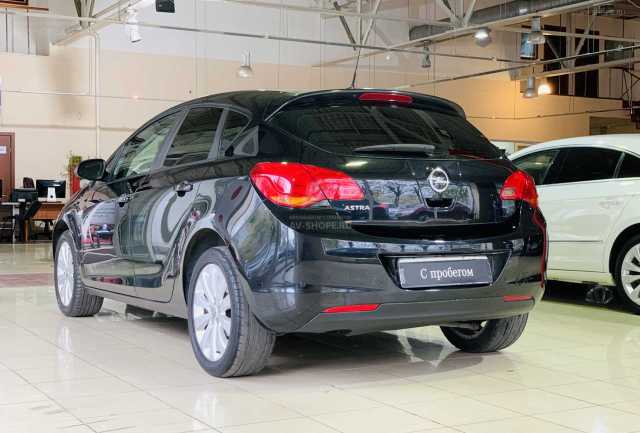 Opel Astra 1.6i MT (115 л.с.) 2011 г.