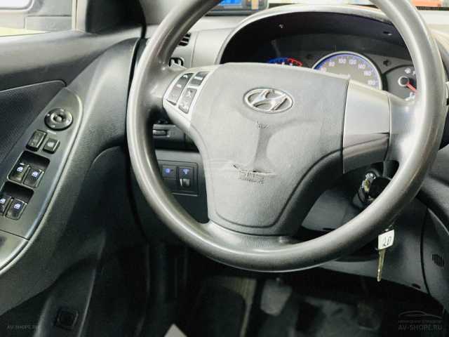 Hyundai Elantra 1.6i MT (122 л.с.) 2010 г.