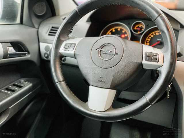 Opel Astra 1.6i AMT (115 л.с.) 2011 г.