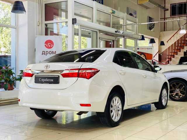 Toyota Corolla  1.6i CVT (122 л.с.) 2014 г.